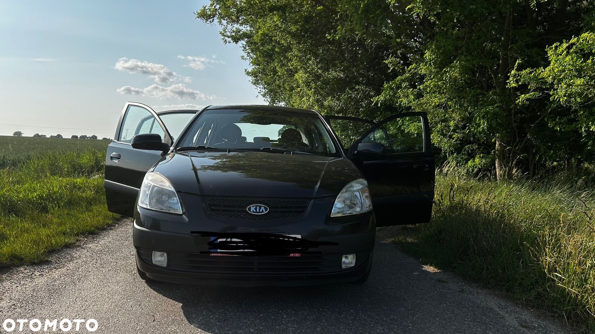Kia Rio 1.4 Comfort - 1