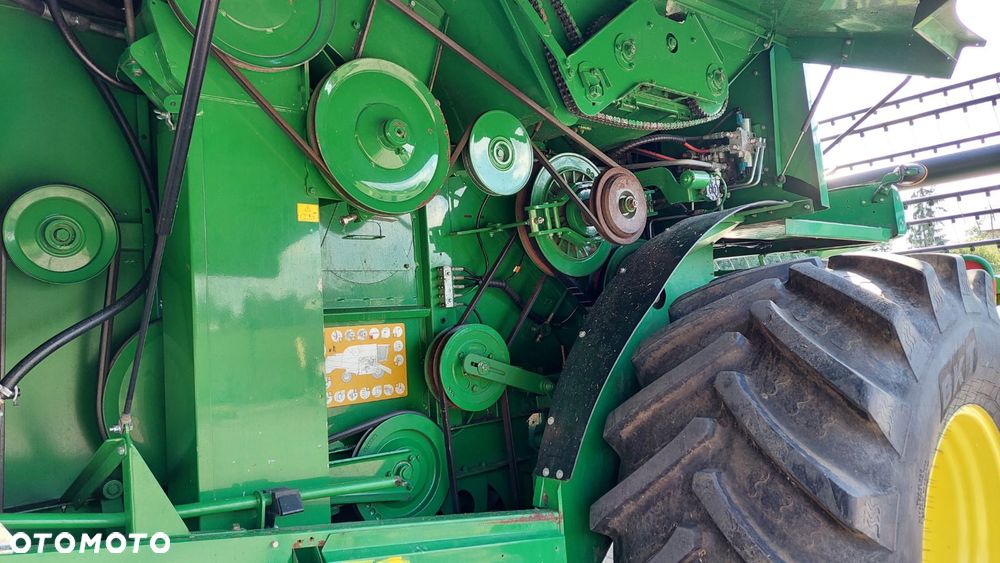 John Deere W440 - 11