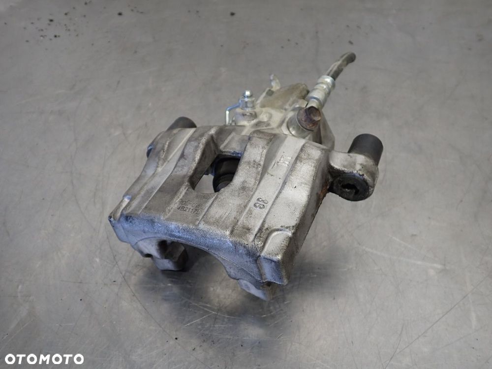 ZACISK HAMULCA PRAWY TYŁ NISSAN ALMERA 2.2 4B2117L - 1