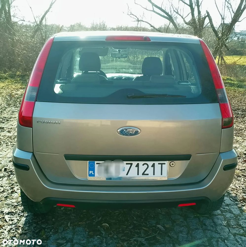 Ford Fusion 1.4 + - 13