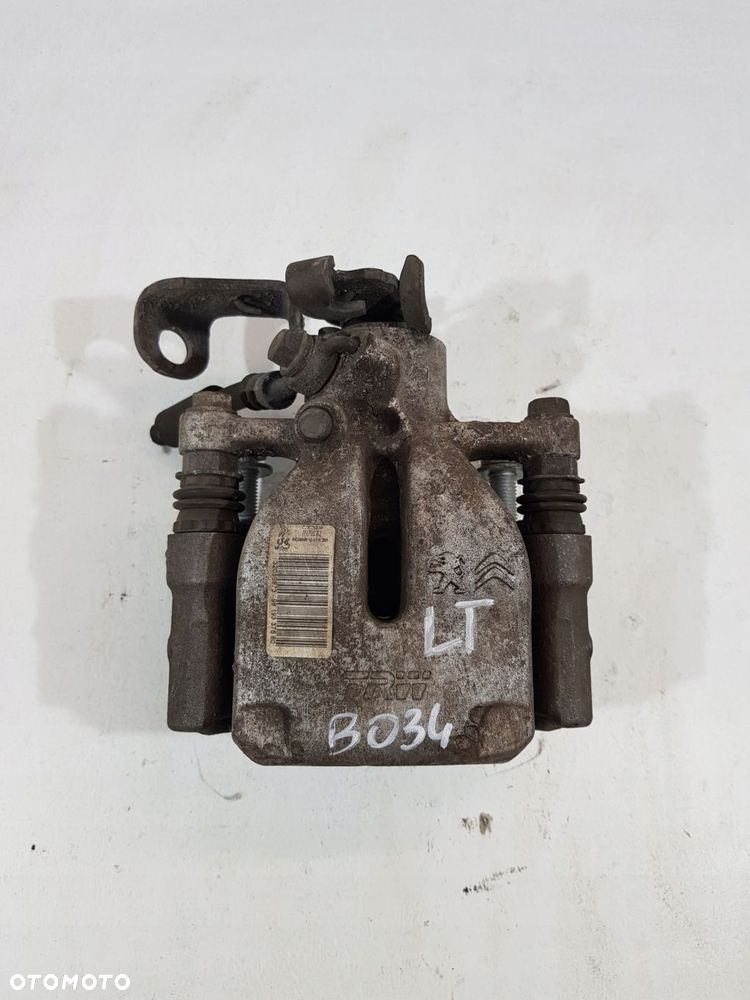 zacisk hamulcowy lewy tył 9819337680 opel combo e berlingo iv 21r 1.5d - 1