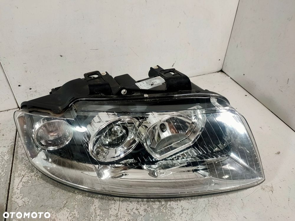 lampa przód prawa audi a4 b6 - 1