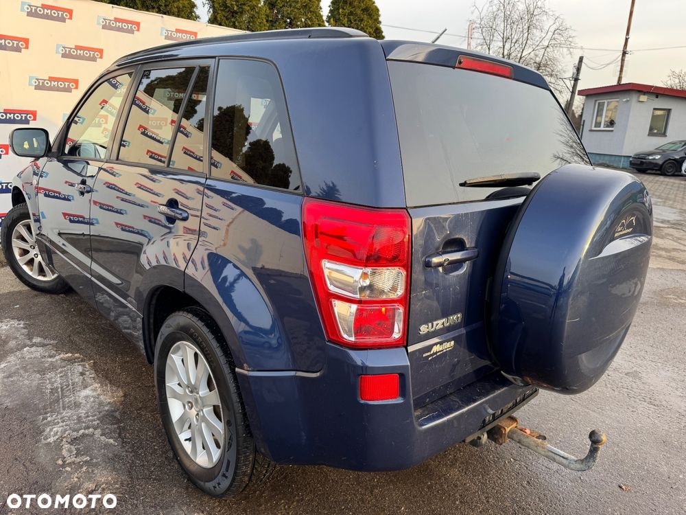 Suzuki Grand Vitara 2.0 Comfort + Family - 7