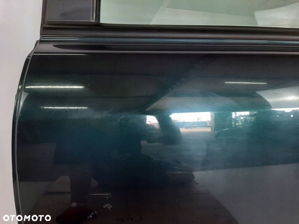 KIA SPORTAGE 2 II LIFT 09R DRZWI LEWY TYL KOD E2 - 11