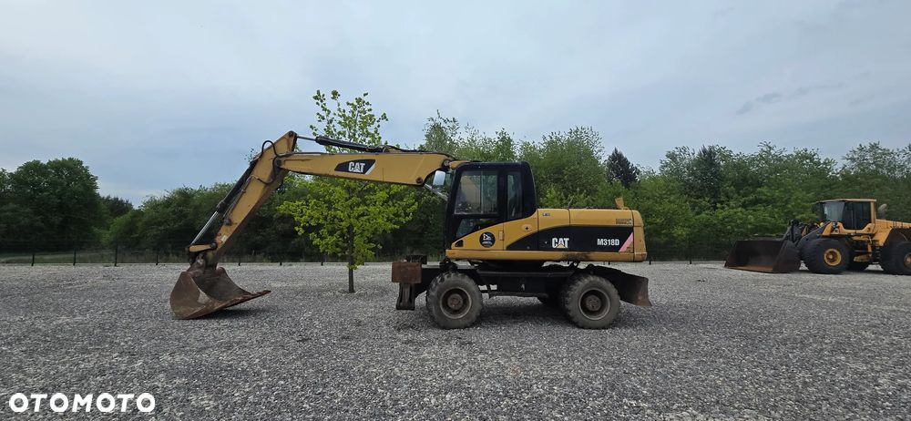 Caterpillar M318D - 1