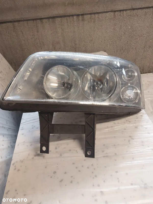 Reflektor lampa przód lewy vw t5