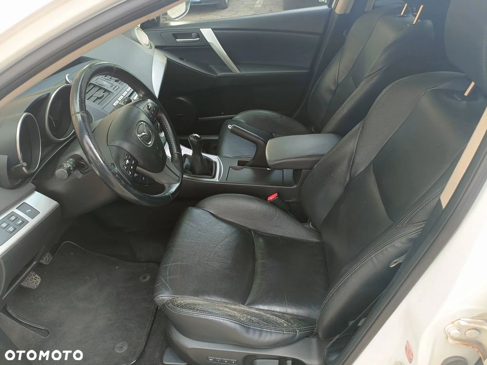 Mazda 3 2.0 Exclusive + - 13
