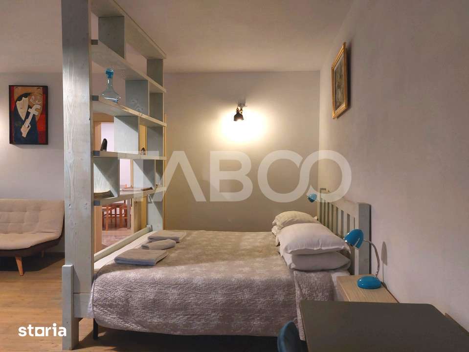 Garsoniera de inchiriat la casa camera bucatarie baie Lidl Cisnadie — fotografia 1