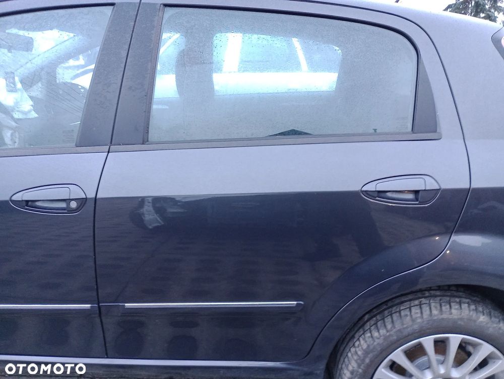 FIAT GRANDE PUNTO EVO drzwi lewe tylne lewy tył 634/C - 1