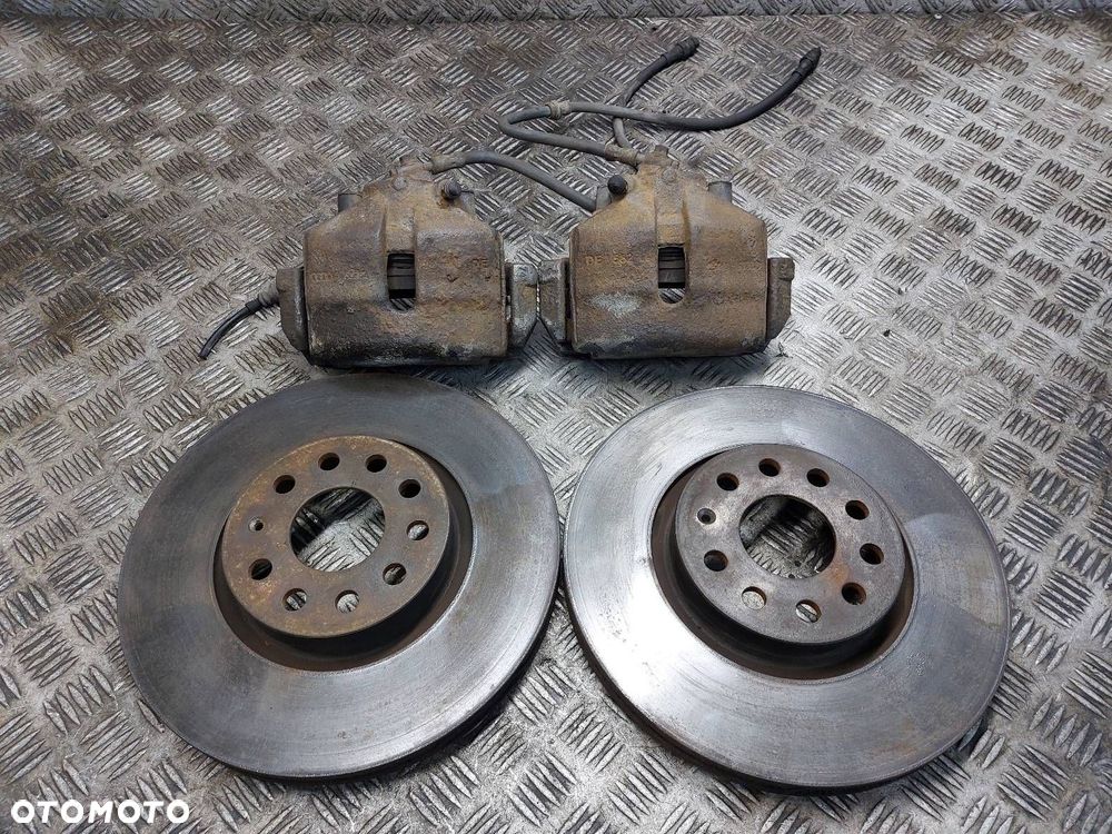 TARCZE HAMULCOWE PRZÓD + KLOCKI + ZACISKI VOLKSWAGEN PASSAT B6 2.0 TDI - 1