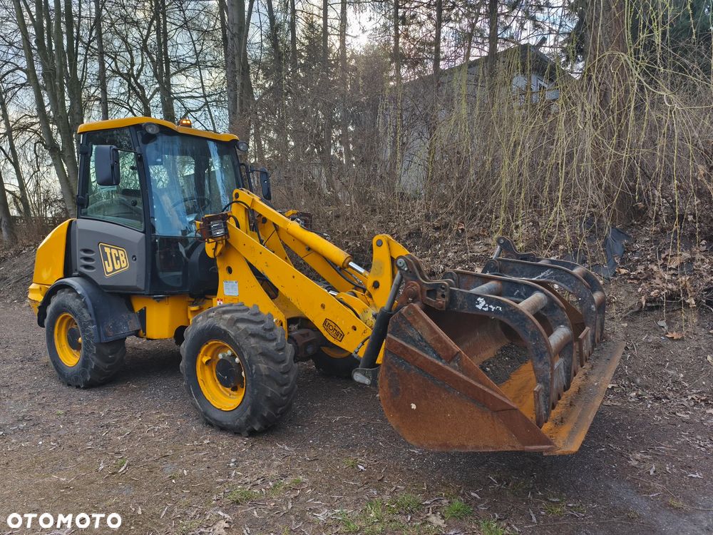 JCB 406 - 1