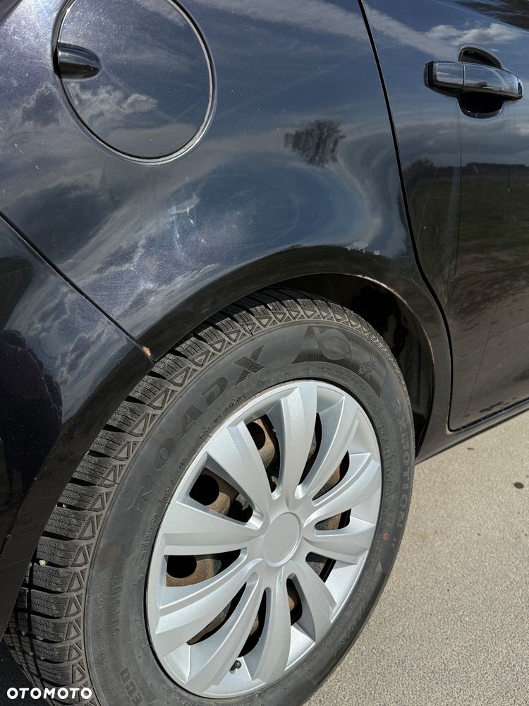 Opel Corsa 1.2 16V Cosmo - 8