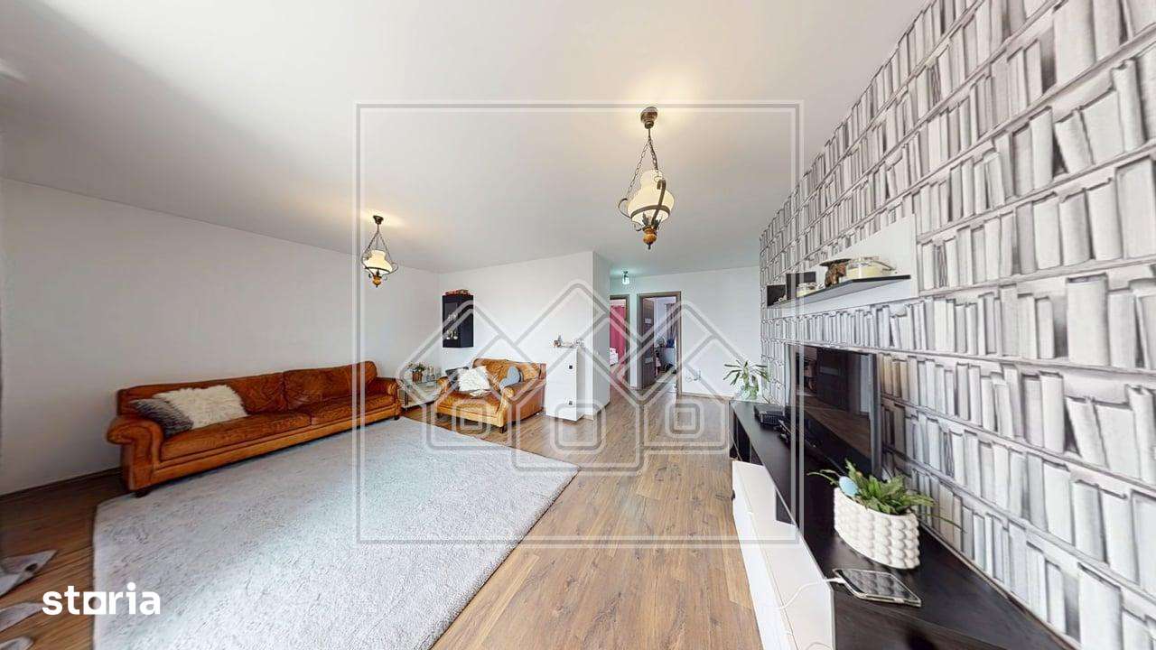 Ap. 3 camere, terasa de 12 mp, decomandat, 74 mp utili, pret bun — fotografia 3