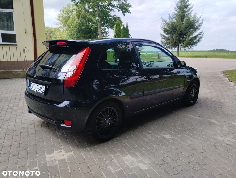 Ford Fiesta 1.4 Ghia - 13