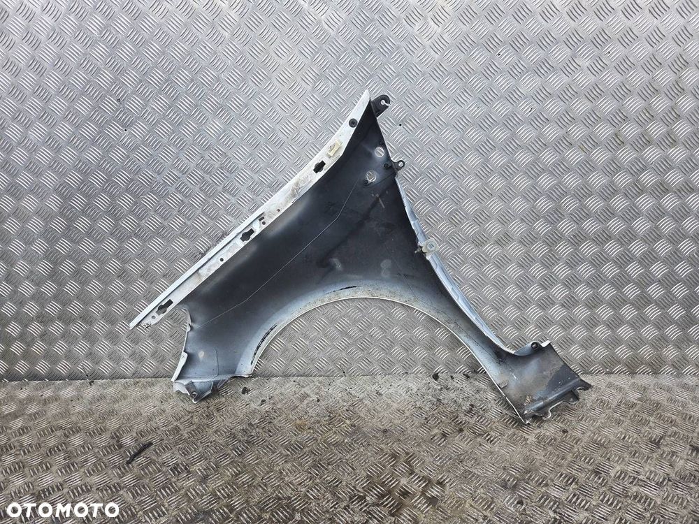 BŁOTNIK PRAWY PRZEDNI RENAULT CLIO 3 - 2
