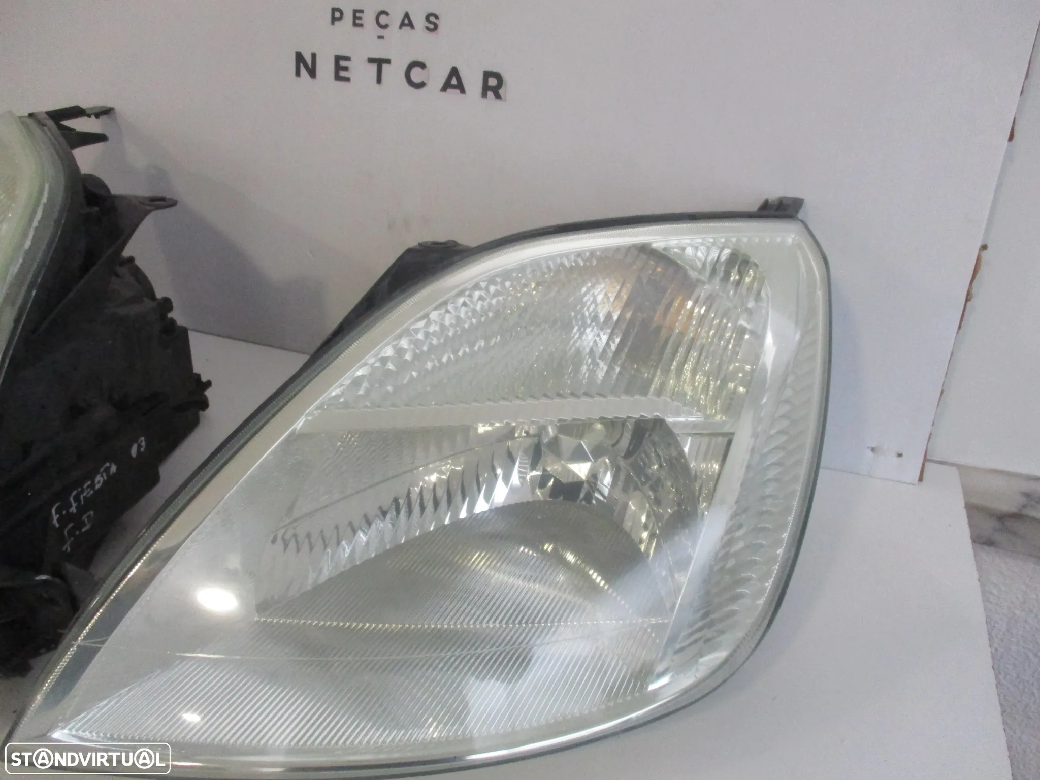Farol Optica ford fiesta 2003 - 2
