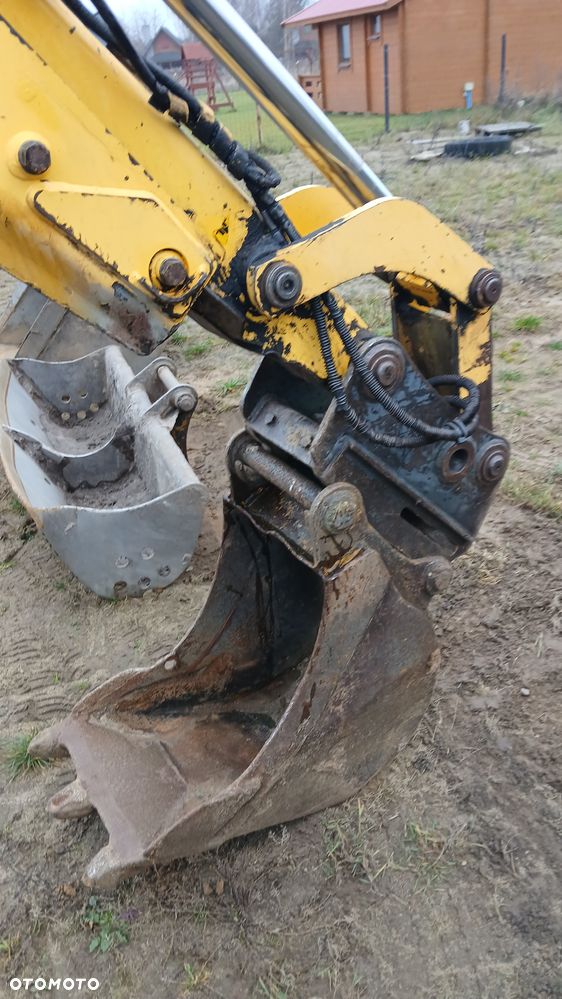 New Holland LB 115 - 40