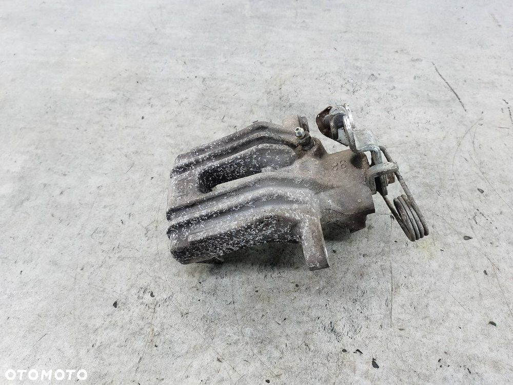 ZACISK HAMULCOWY LEWY TYŁ VW PASSAT B5 FL HART 1.9 TDI - 4