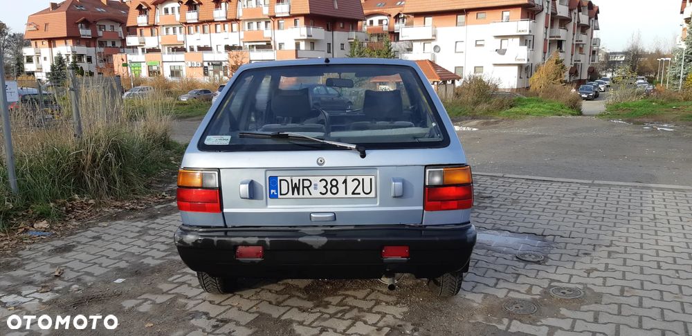 Nissan Micra 1.0 GL - 6