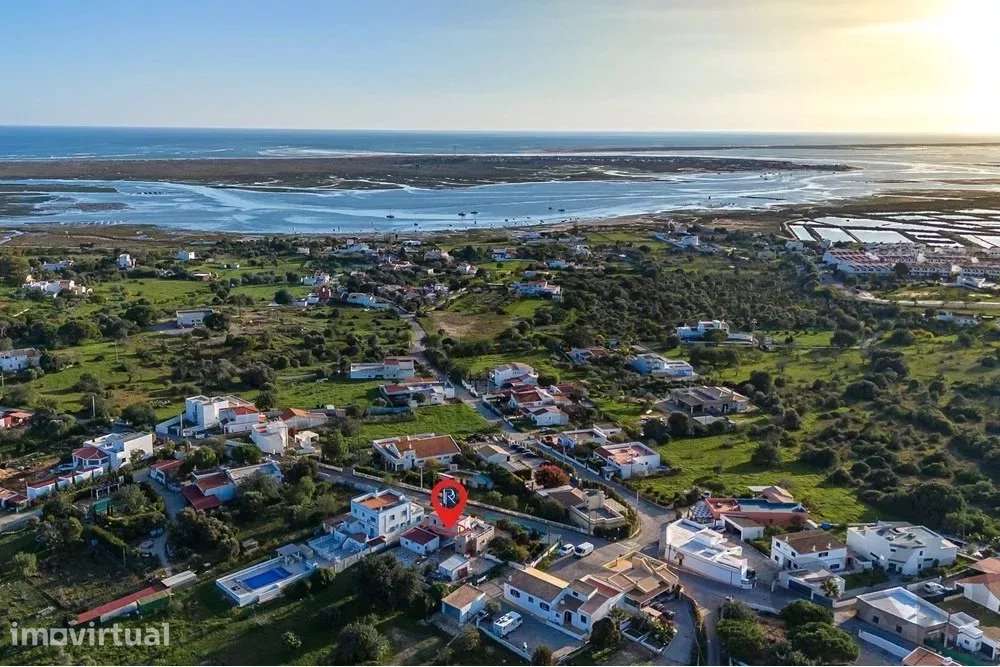 Moradia T2 em lote de terreno com 658m2 junto à Ria Formosa - Grande imagem: 2/45