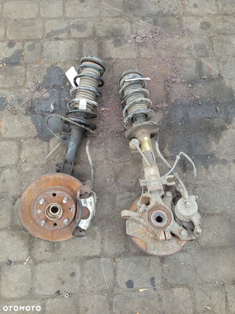 MACPHERSON ZWOTNICA ZACISK LEWY LUB PRAWY CHEVROLET SPARK M300 09-13 - 1