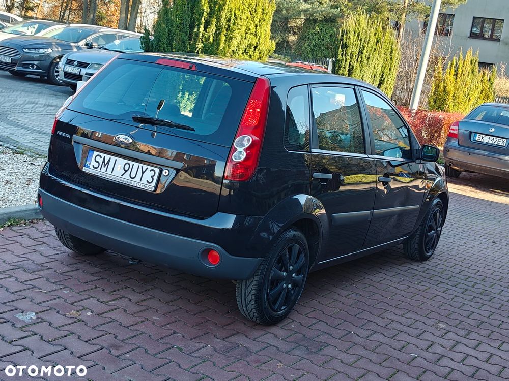 Ford Fiesta 1.3 Ghia - 25