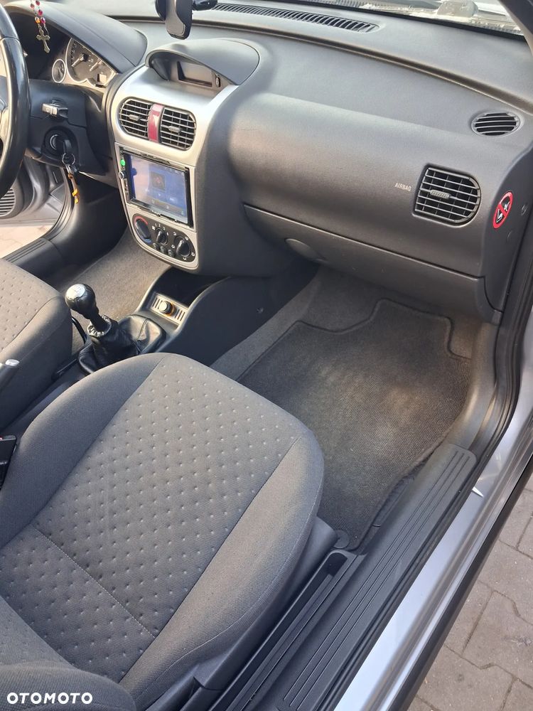 Opel Corsa 1.4 16V Enjoy - 12