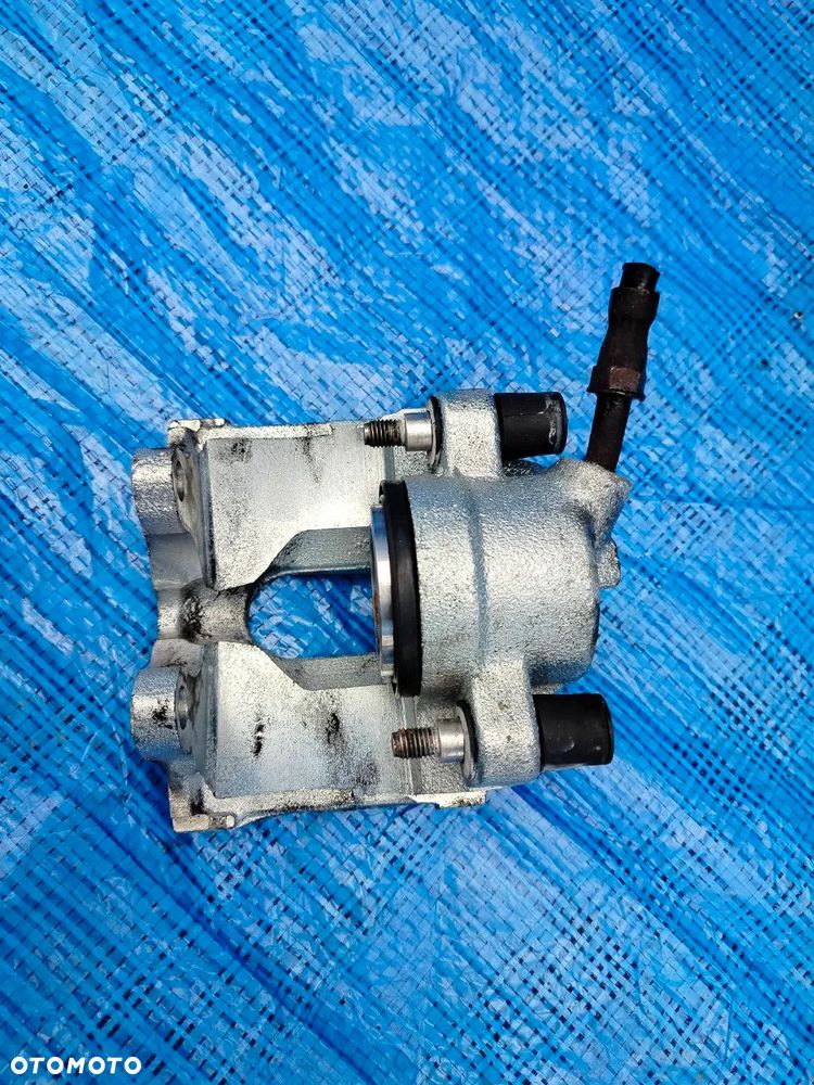 Zacisk hamulcowy prawy PRZÓD PRZEDNI BMW 3 E46 - 2