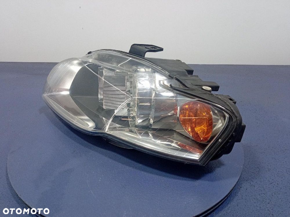 AUDI A4 B7 04-08 REFLEKTOR LEWY LAMPA PRZÓD  1305236052 - 2