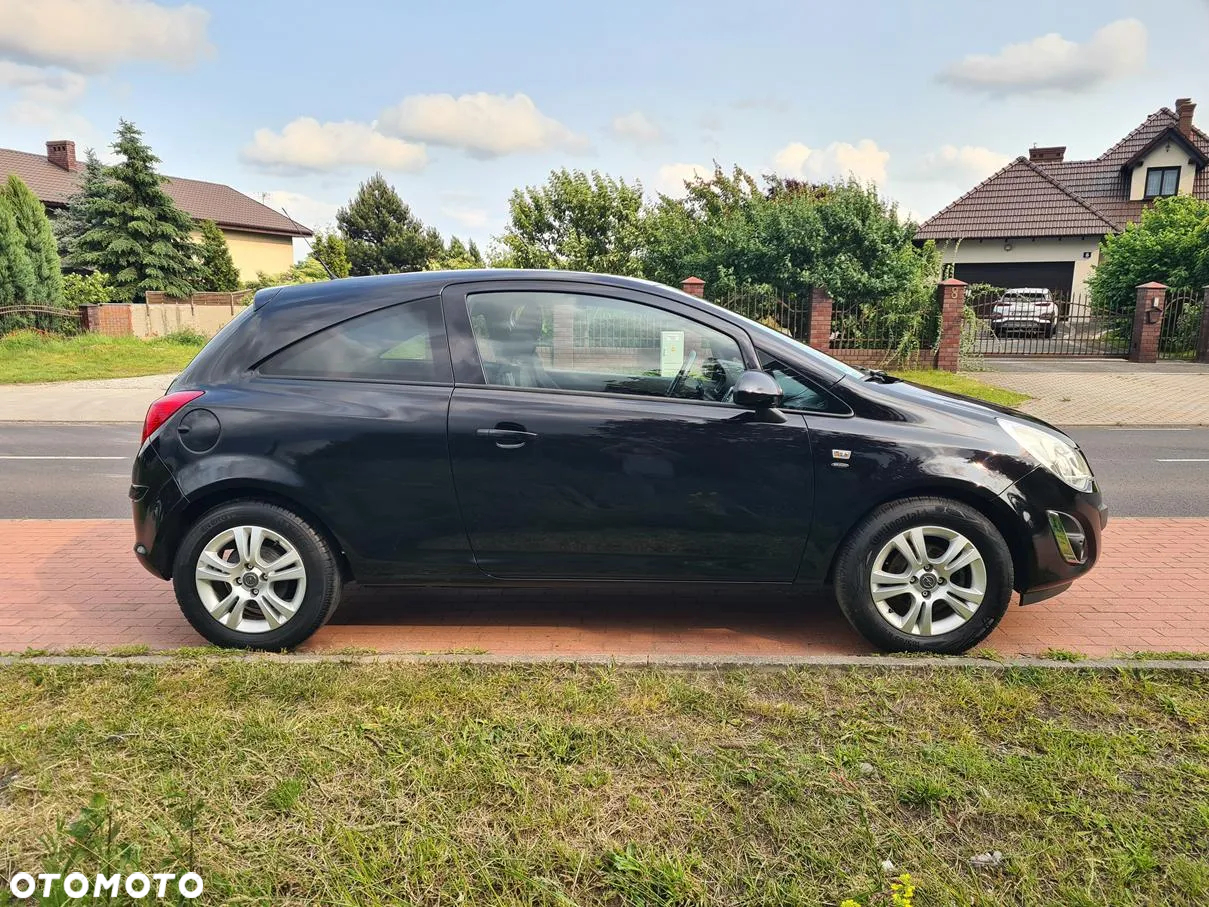 Opel Corsa 1.4 16V Cosmo - 5