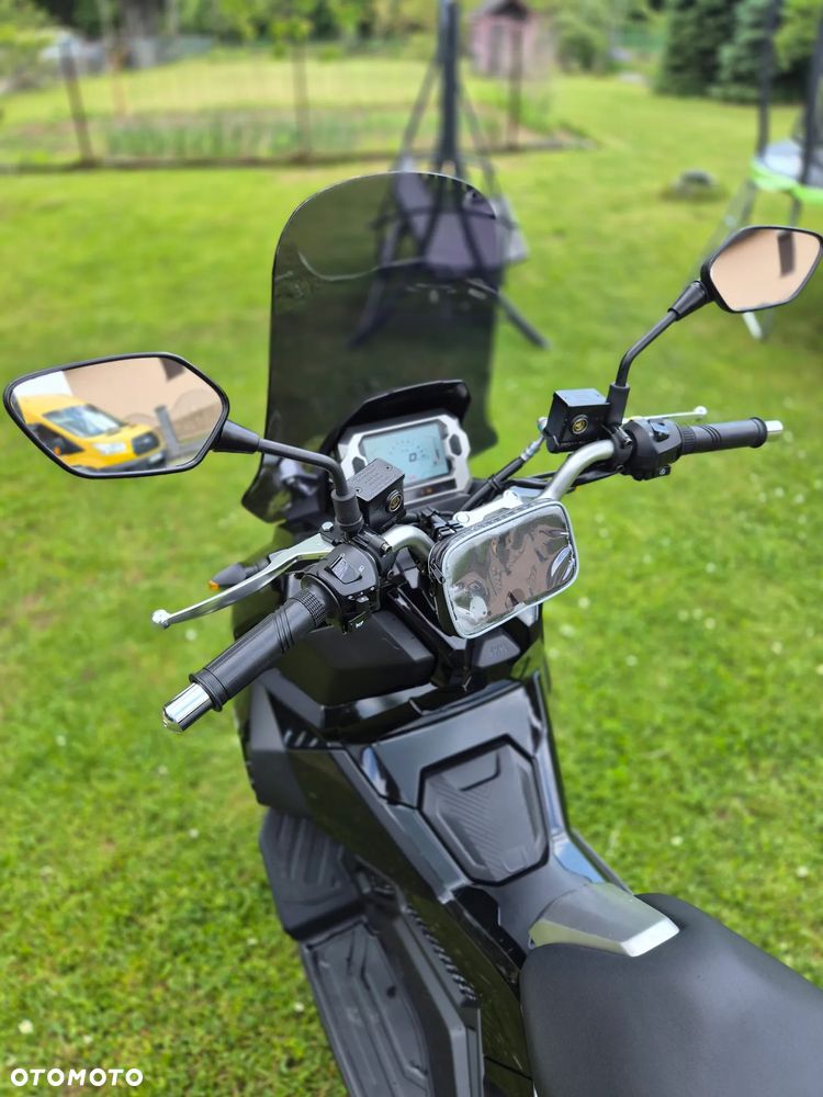 SYM ADX - 11