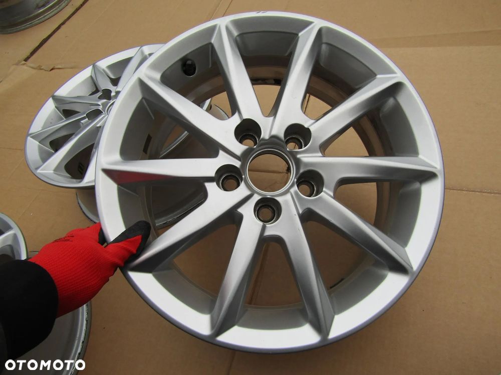 4x Felgi Aluminiowe 15 Skoda Fabia II III Praktik Rapid Roomster Seat Ibiza Leon I VW Golf IV 4 Polo IV V Bora 6 j 5x100 ET38 piasta 57,1 mm / Oryginalne - 18