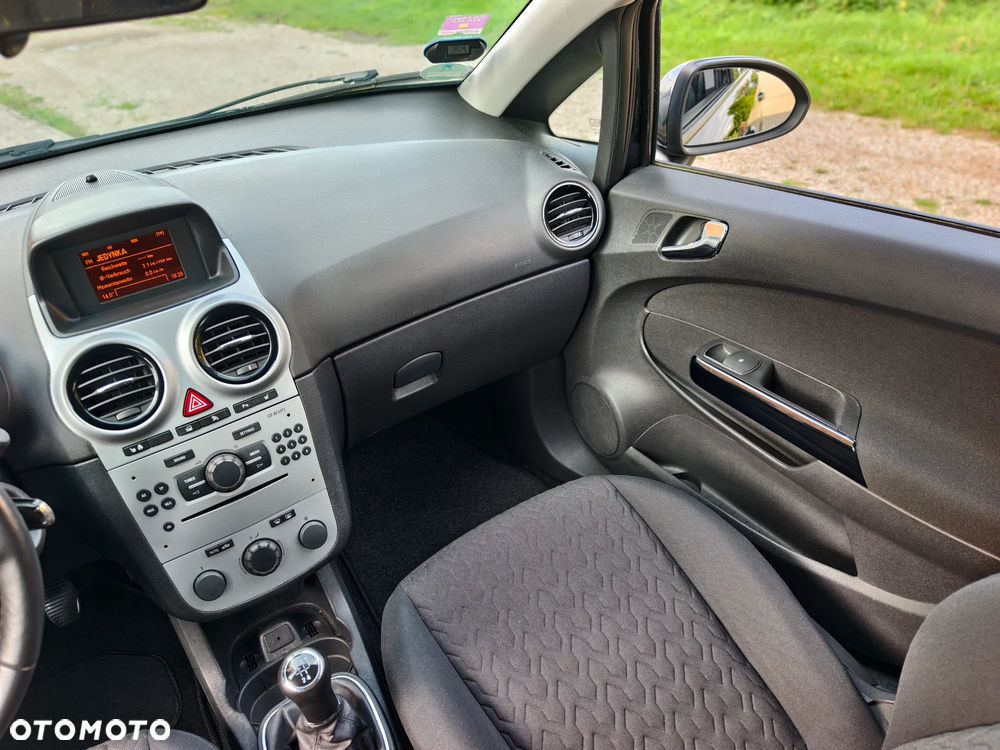 Opel Corsa 1.4 16V Active - 12