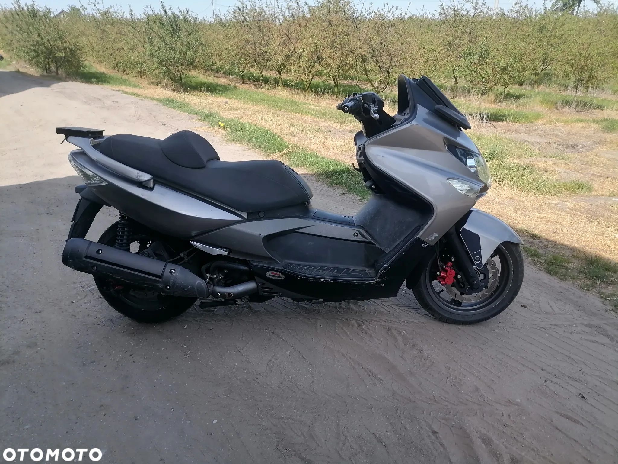 Kymco Xciting 500 gaznik cały na części silnik lampa czasza lagi stacyjka gaźnik - 1