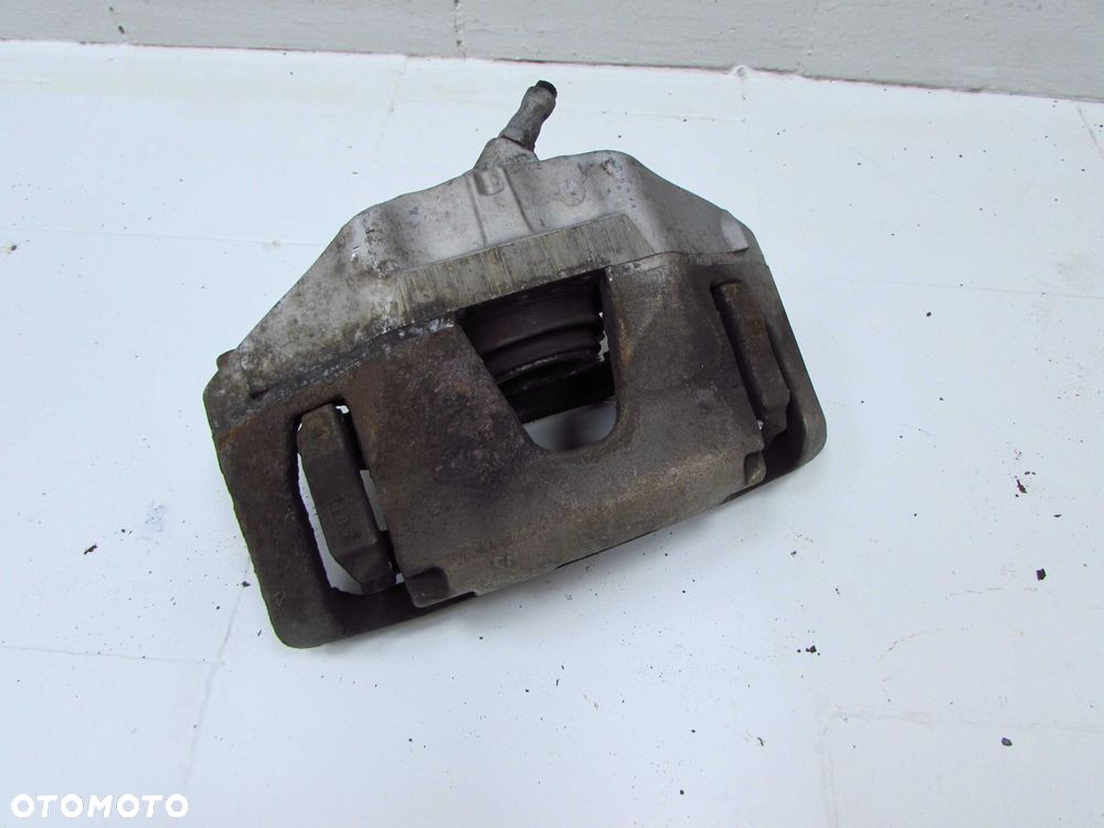 VOLVO S40 V50 C30 C70 LIFT 2.0 D4 06-13 ZACISK HAMULCOWY PRZOD LEWY 975 - 2