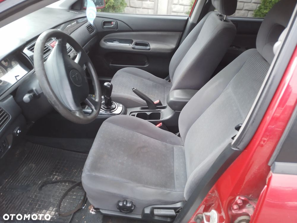 MITSUBISHI LANCER VII KOMBI 1.6 16V 03 - 08  OSŁONA PRZECIWSŁONECZNA PRAWA LEWA - 32