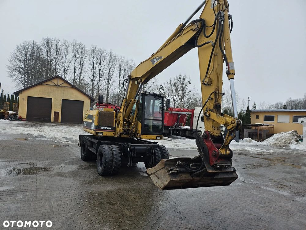 Caterpillar 312 - 1