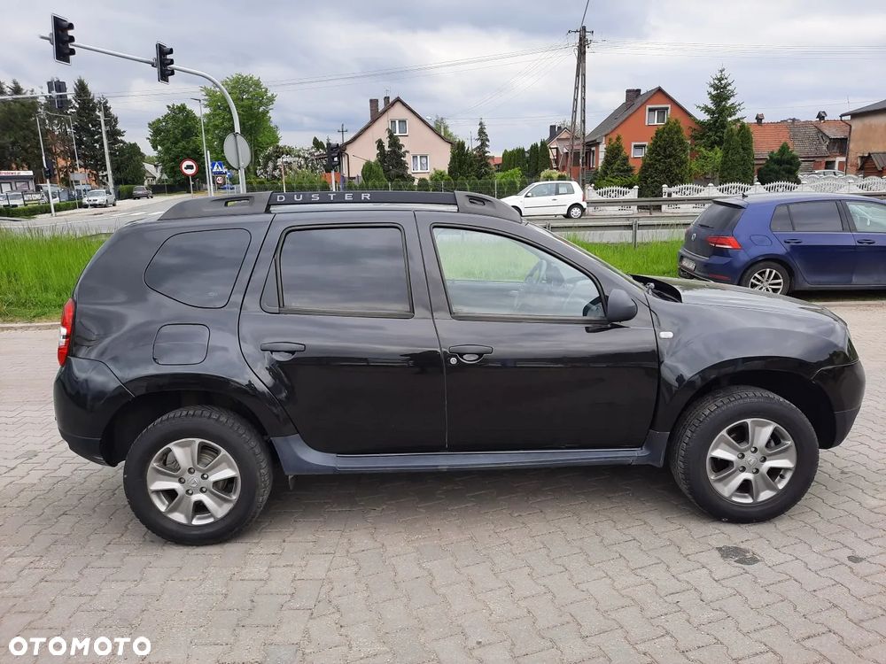Dacia Duster 1.6 SCe Laureate S&S - 6