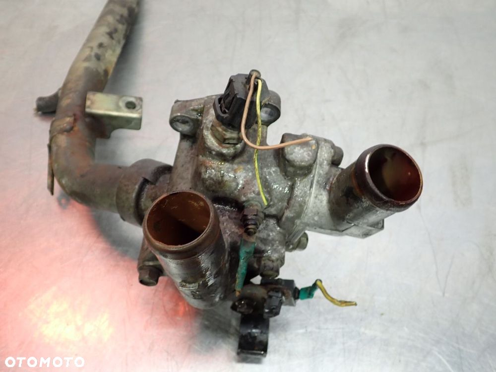 OBUDOWA TERMOSTATU MITSUBISHI OUTLANDER I - 4