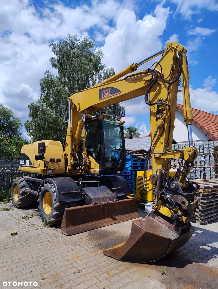 Caterpillar M313C - 1