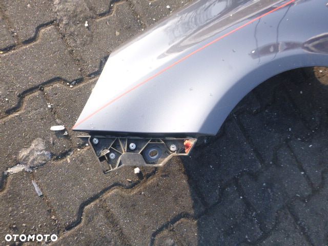 BŁOTNIK LEWY PRZÓD LEWY PRZEDNI OPEL CORSA D Z168 - 7