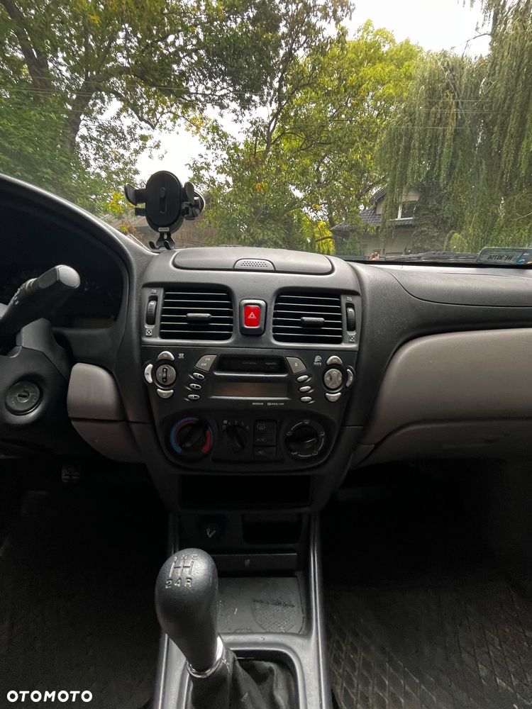 Nissan Almera 1.5 Comfort High - 4