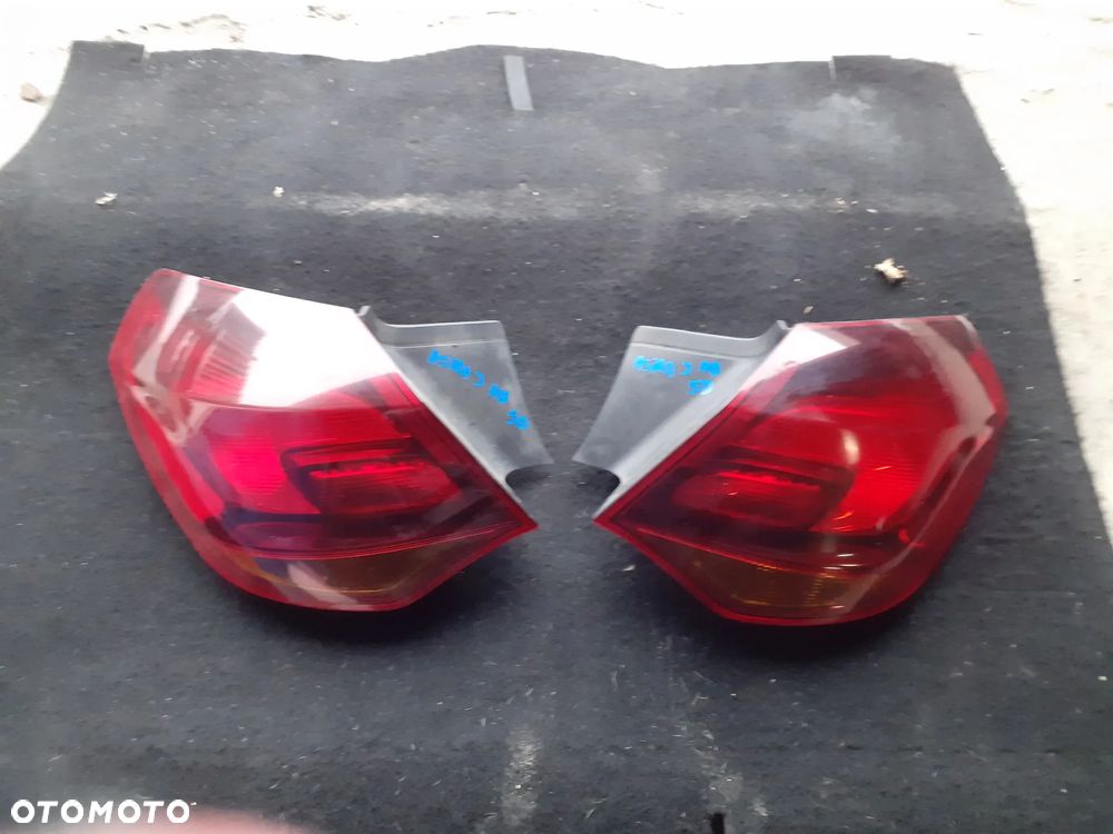 12146 Lampa lewy prawy tył Opel Astra J HB 5 drzwi - 1