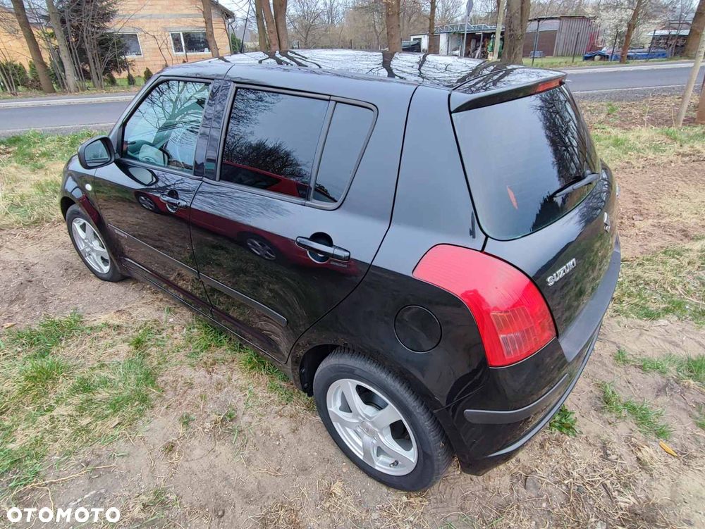 Suzuki Swift 1.3 Club - 4