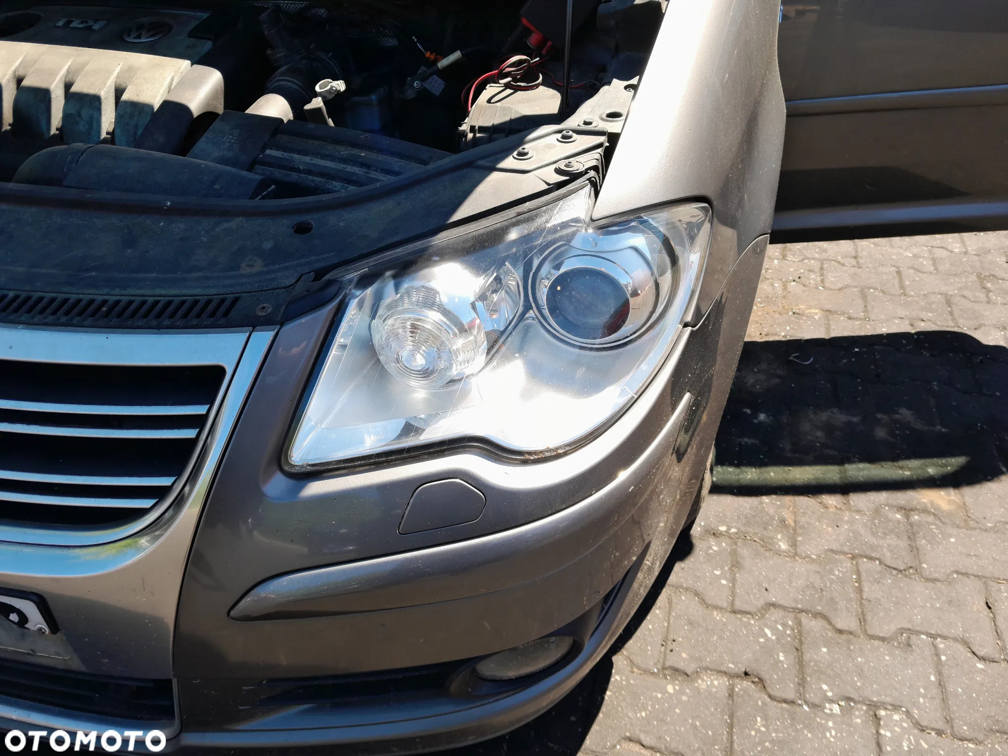 Lampa przednia lewa xenon VW Touran I lift 06-10r. - 2