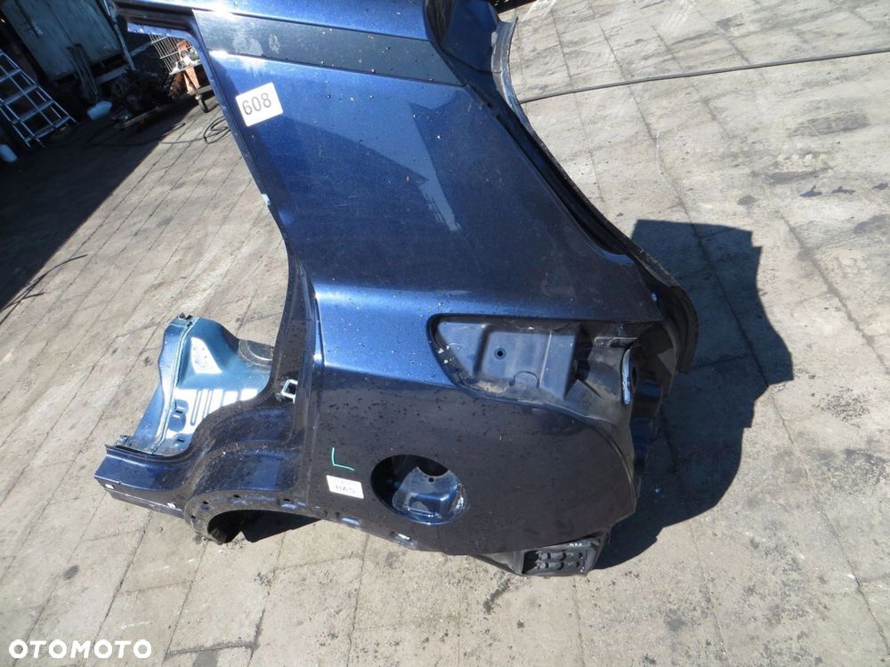 SSANGYONG TIVOLI BŁOTNIK ĆWIARTKA LEWA TYŁ TYLNA 14- - 2
