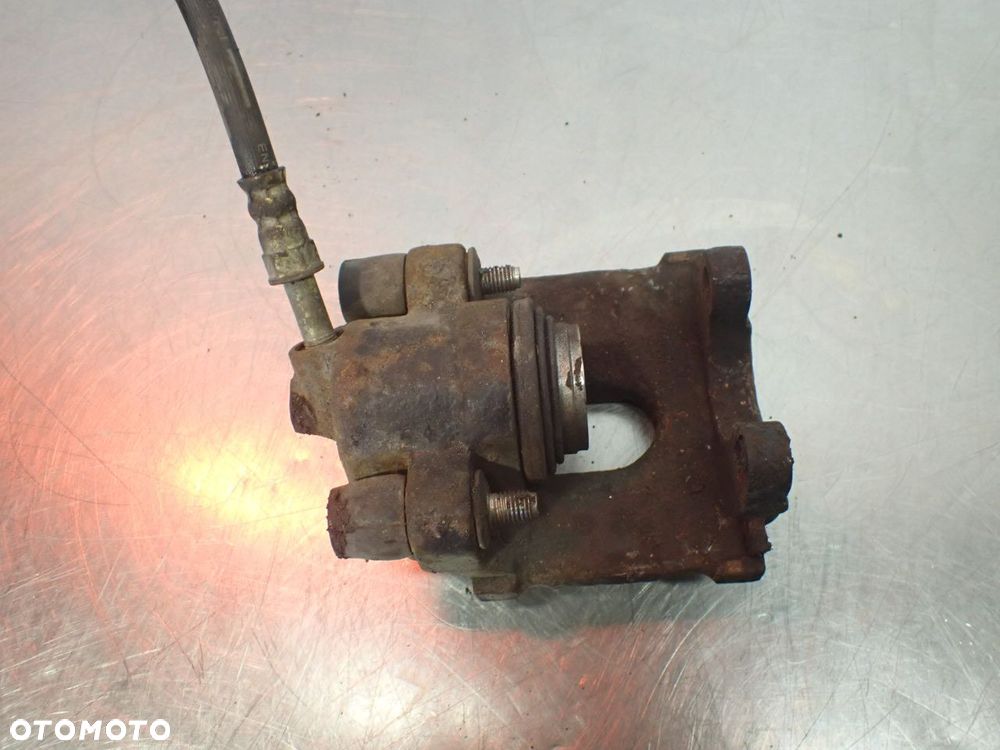 ZACISK HAMULCA PRAWY TYŁ BMW E36 - 5