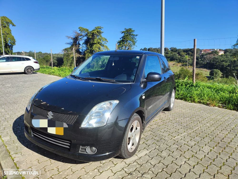 Suzuki Swift 1.3 DDiS GL - 1