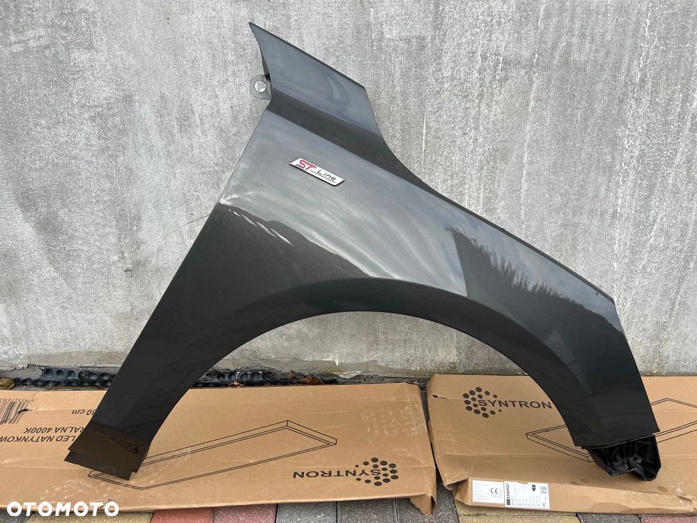 BŁOTNIK PRZÓD PRZEDNI PRAWY FORD FOCUS MK4 NR LAKIERU BJ 2020 ROK ORYGINAŁ MOZNA ZAŁOŻYĆ BEZ MALOWANIA - 1