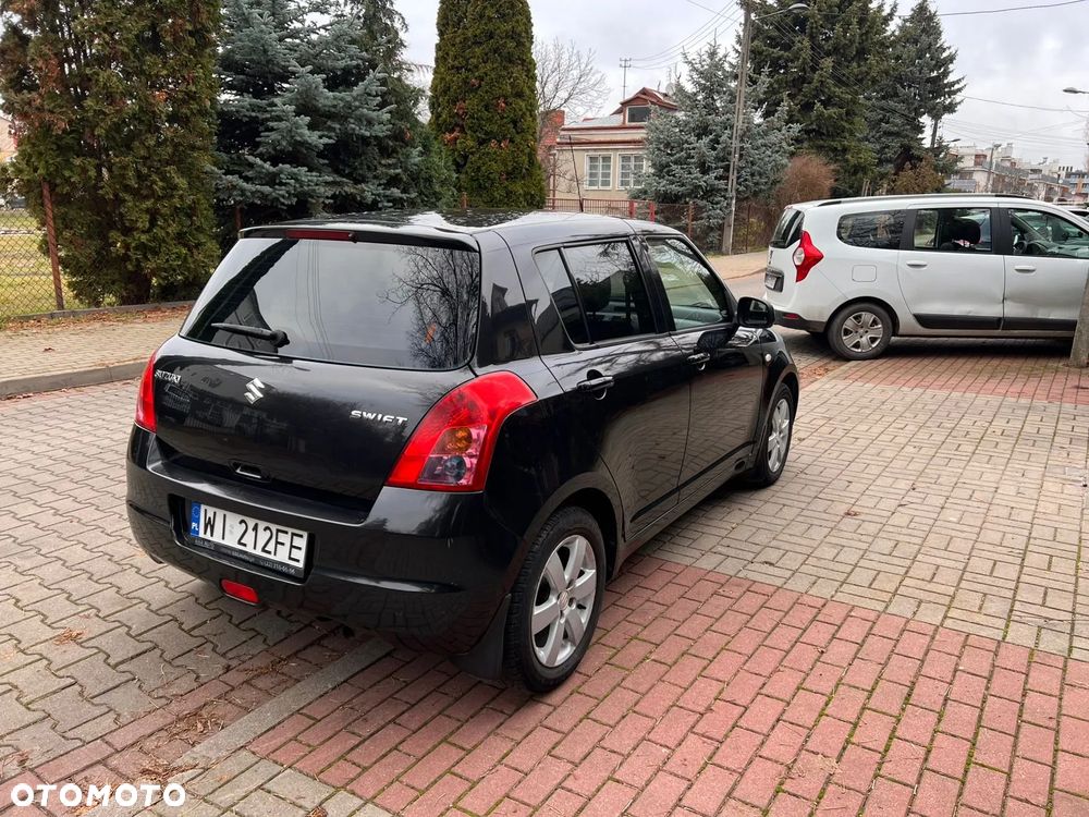 Suzuki Swift 1.3 Club - 3